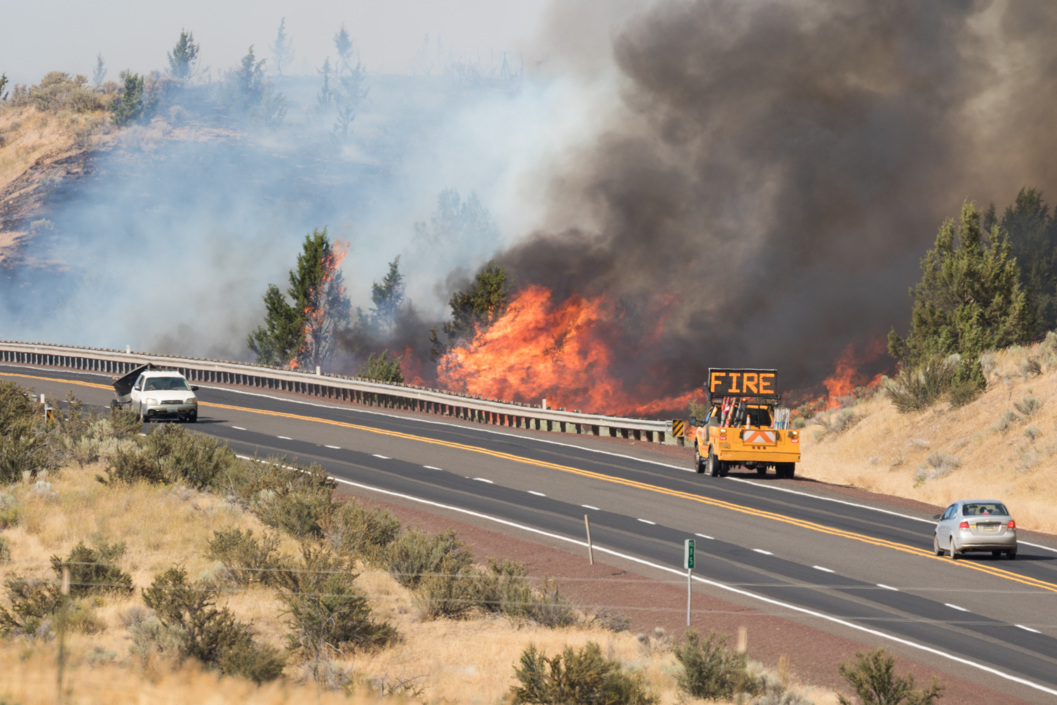 Emerson wildfire burning near highway 97