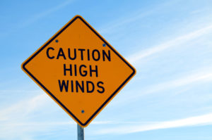 Caution high winds sign