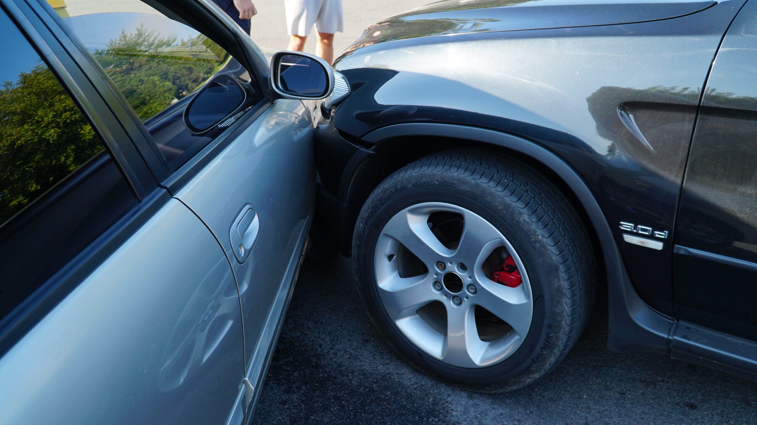 traffic-accident-wrecked-car-car-crashed-into-parked-car-on-neighborhood-street