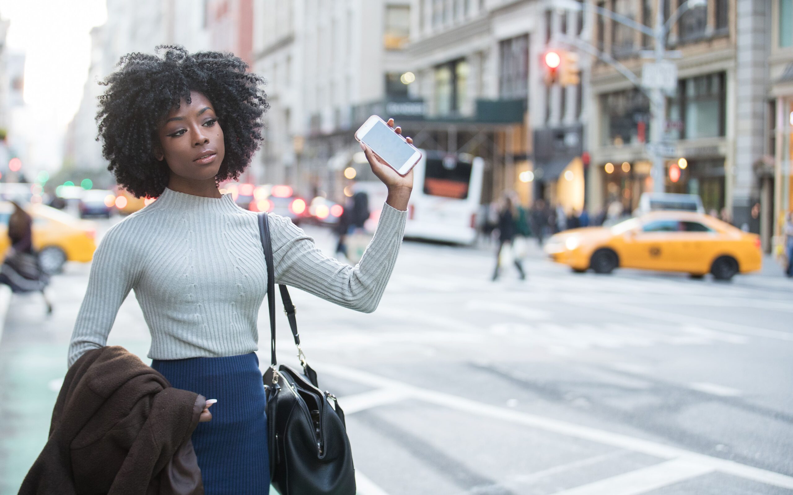 woman-hails-rideshare-driver